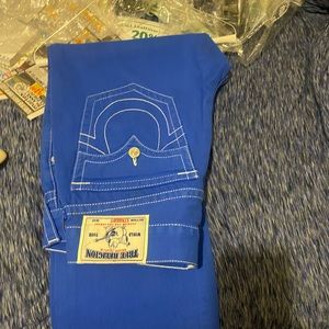 I’m selling a pair royal blue true religion jeans